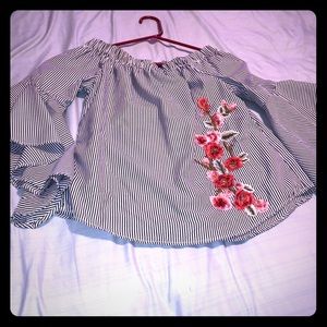 A nice blouses trip and flowers shirt!